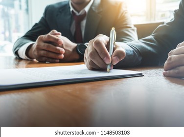 Business man sign a contract investment professional document agreement. meeting room. - Shutterstock ID 1148503103