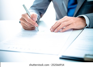 Business Man Signing A Contract