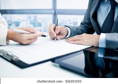 Business Man Signing A Contract