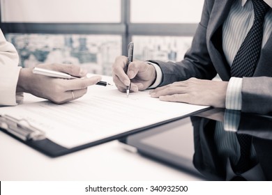 Business Man Signing A Contract