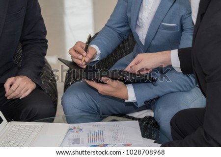 Business man signing the contract in flie after meeting