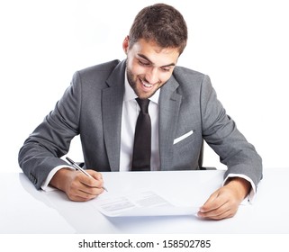 Business Man Singing A Contract On His Desk On White Background