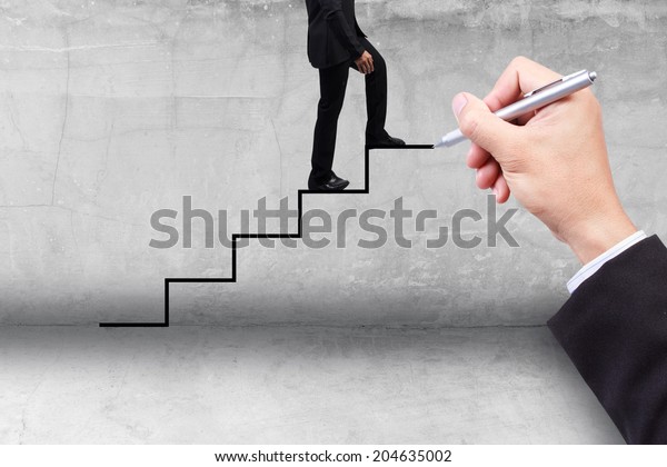 business man stepping ladder drawn by\
hand with pen idea concept for success and growth\
business