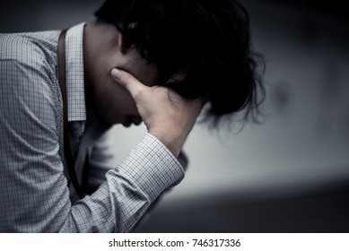 business man is stressed from his work. depression and anxiety concept. - Shutterstock ID 746317336