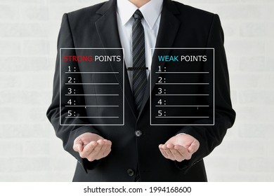 Business Man With Strong And Weak Points List