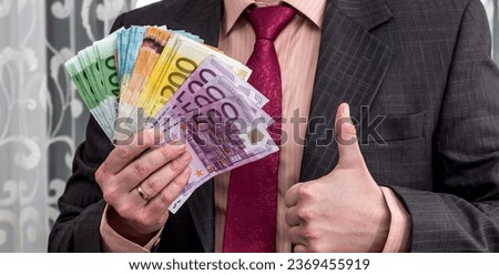 business man in suit counting euro money, cash money concept