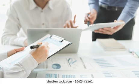 Business man supervising and secretary to execute business plan and consultant analyzing company annual financial report balance sheet statement working with documents graphs. Audit and consultant

 - Shutterstock ID 1662472561