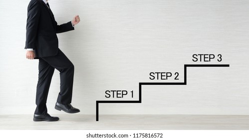 Business man taking steps - Powered by Shutterstock