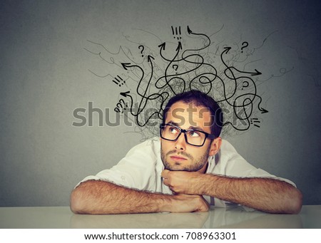Business man thinking contemplating a solution