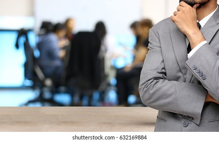 Business Man Thinking With Meeting Team Background