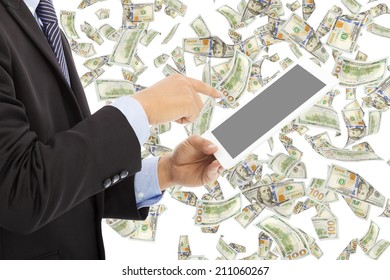 business man touching tablet with money rain