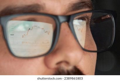 Business man trader broker analyst investor analyzing stock exchange trade crypto financial market looking at computer screen wearing glasses with stockmarket digital chart reflection, close up view. - Powered by Shutterstock