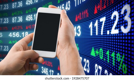 Business Man Trader Investor Using Mobile Phone With Financial Stock Market Graph