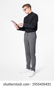 Business Man In Turtleneck Working On Tablet Full Body Shot