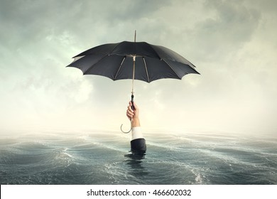 Business Man With Umbrella Drawn In Sea