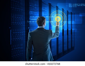 Business man using circle interface in data center