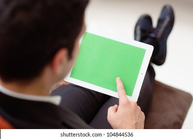 Business Man Using Digital Tablet Pc With Green Screen For Internet And Email