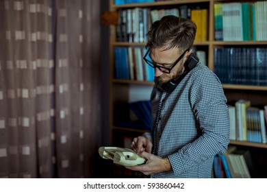 Business Man Using Land Line Phone 