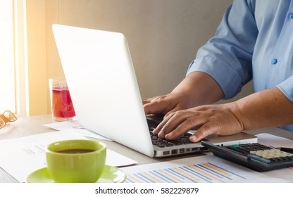 Business man using laptop computer - Shutterstock ID 582229879