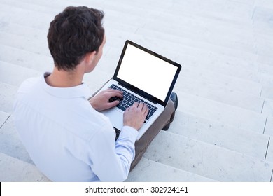 Business Man Using Laptop With White Screen