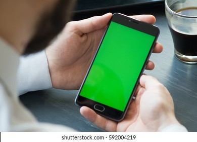 Business Man Using Smart Phone With Green Screen For Internet And Email. Sequence