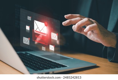 Business man using smartphone and computer that show warning sign after got attack phishing email by malware from hacker that commit cyber crime or software crash to cause an error.