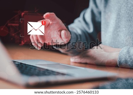 Business man using smartphone and computer that show warning sign after got attack phishing email by malware from hacker that commit cyber crime or software crash to cause an error.