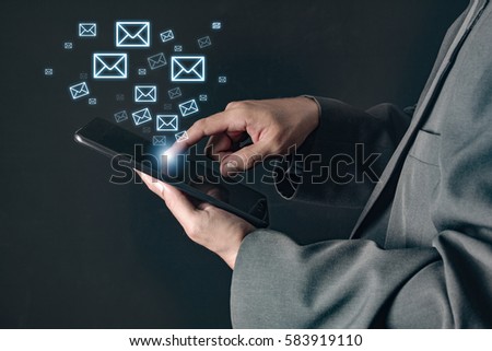 business man using tablet computer and email icons