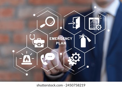 Business man using virtual touch screen clicks text: EMERGENCY PLAN. Business emergency plan concept. Checklist to do in disaster, continue business and build resilience concept. Smart emergency plan.