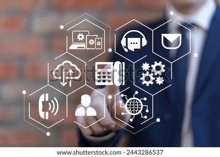 Business man using virtual touch screen presses icon: IP telephone. Concept of VOIP telecommunication. IP telephony and connection line web technology.