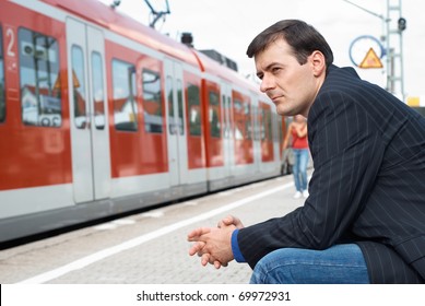 Business Man Wait For A Train