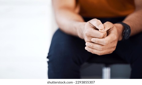 Business man, waiting room and hands clasped for interview, recruitment or hiring in office mockup. Nervous, anxiety and male professional sitting to wait for human resources, onboarding and hr.