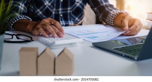 Business man waiting signing agreement contract for buying house or condominium. Bank manager concept. - Shutterstock ID 2014705082
