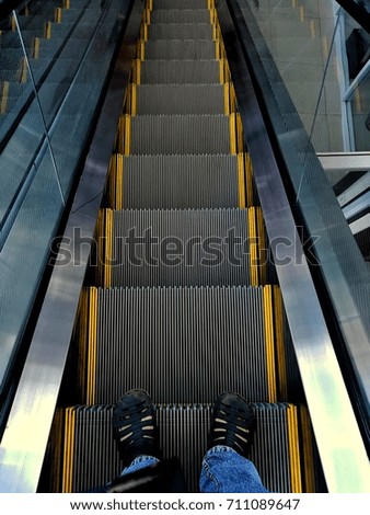 Similar – abwärts Mensch Mauer Wand