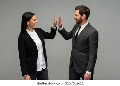 Business Man And Woman Giving Hi Five And Bump Hand Together For Team Work. Diversity Business Team Concept 