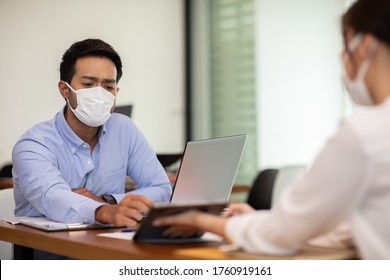 Business Man And Woman Wearing Face Mask Meeting And Working Together For Discussion And Brainstrom To Get Ideas Or Marketing Solution With Social Distance Due COVID-19 Virus Flu Pandemic And Protect