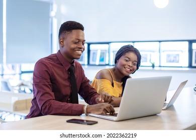 Business Man And Women African American Black Skin Addressing Working With Laptop Corporate Business Meeting In Office.