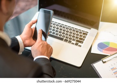 Business man work with phone and laptop