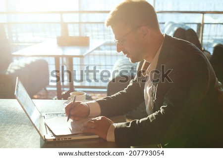 business man working with documents and laptop 