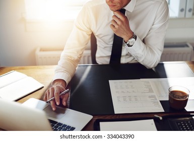 Business man working at office and laptop   documents his desk  consultant lawyer concept