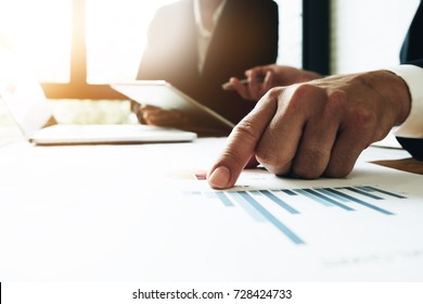 Business man working at office with laptop and documents,businessmen using documents at meeting, Support Concept, Business team - Shutterstock ID 728424733