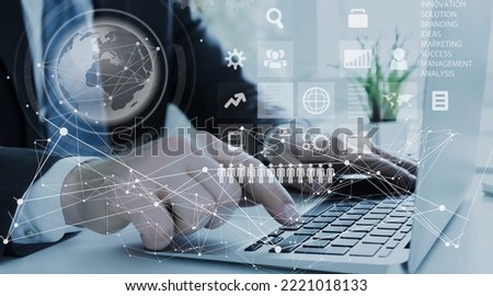 Business man working on computer with info-graphic
