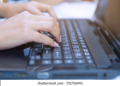 Business man working on a table with laptop - Shutterstock ID 731706991