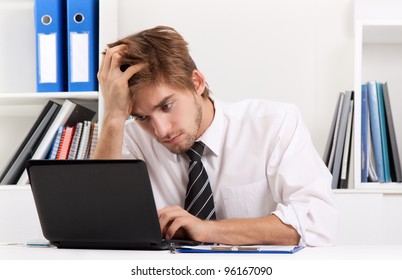business man working problem using laptop looking at screen, hold head hand pain, ache, businessman tired, overworked sitting at the desk stress, at office, computer error concept