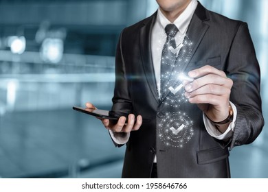 Business Man Works With Check List On Virtual Computer Screen.