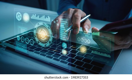 Business Man Works With Vr Financial Artificial Intelligence AI Cloud Computing And Big Data Futuristic Robot Assistant And Digital Data Visualization.