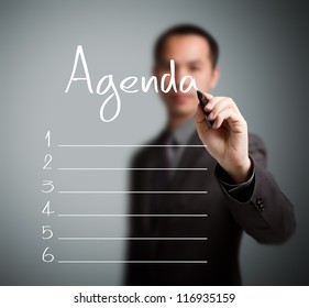 Business Man Writing Blank Agenda List