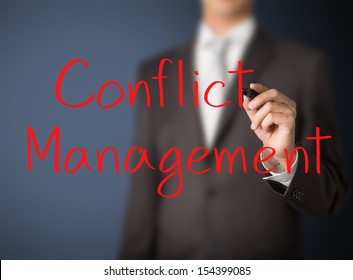 Business Man Writing Conflict Management