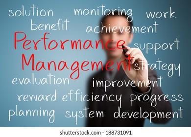 Business Man Writing Performance Management Concept