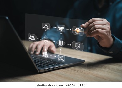 Business management workflow concept, Businessman use laptop making workflow chart, Company organize business flow chart management, Success in the organization, Goal setting, Best management system - Powered by Shutterstock - Get 15% off with code: PIKWIZARD15